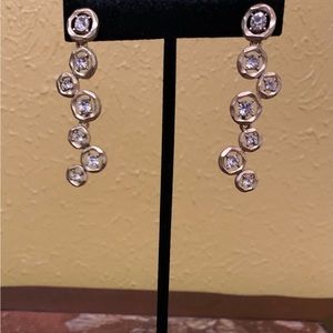 Gold dangling covered earrings